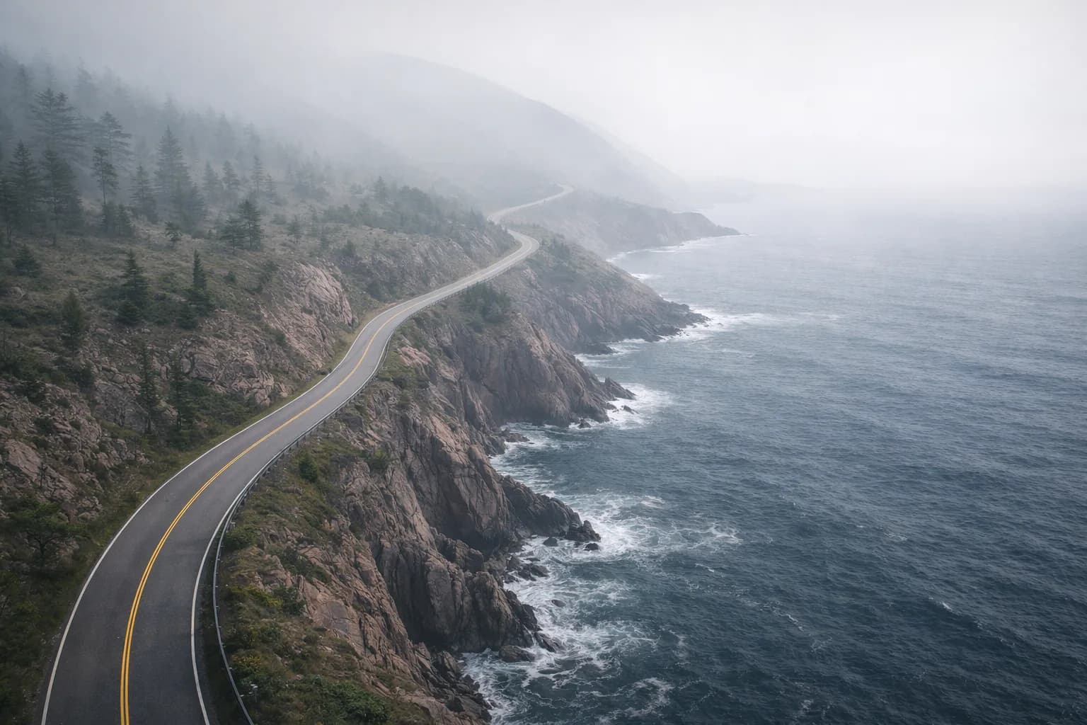 Coastal road winding along an ocean shoreline